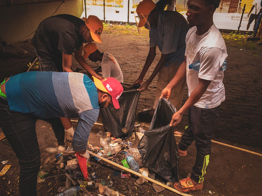 Community volunteers collecting waste during a clean-up drive