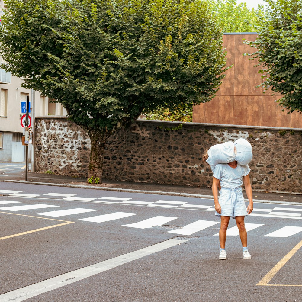 a person walking across a street