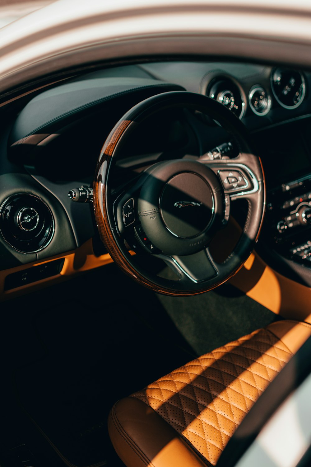 a close up of a car's steering wheel