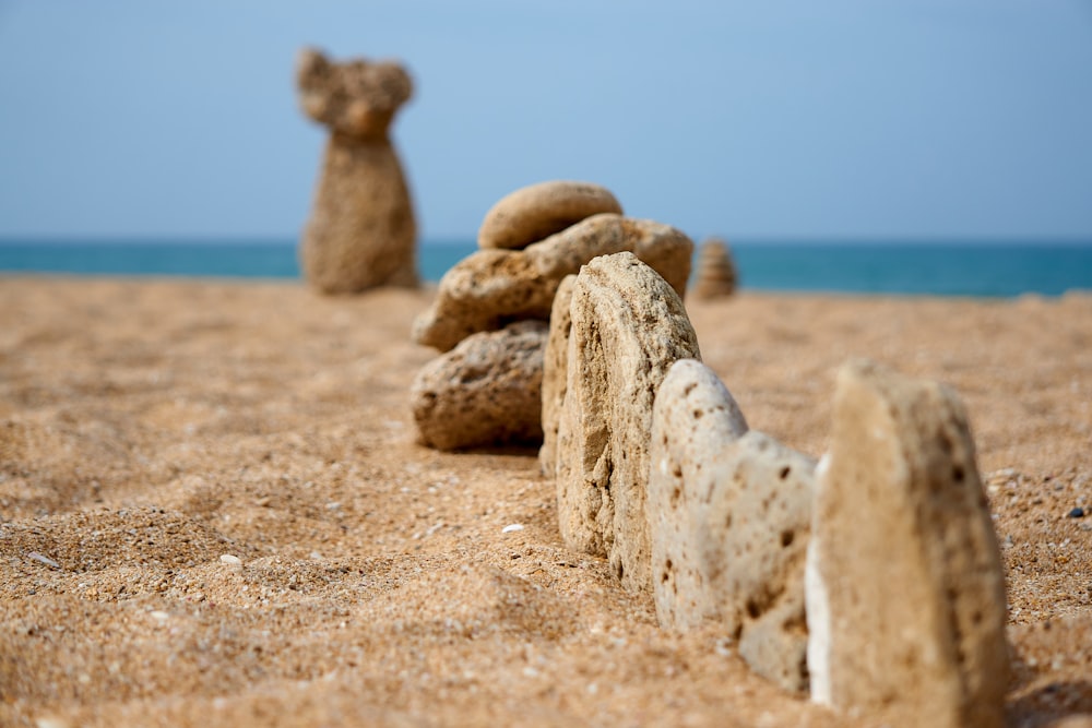 a group of rocks on a beach
