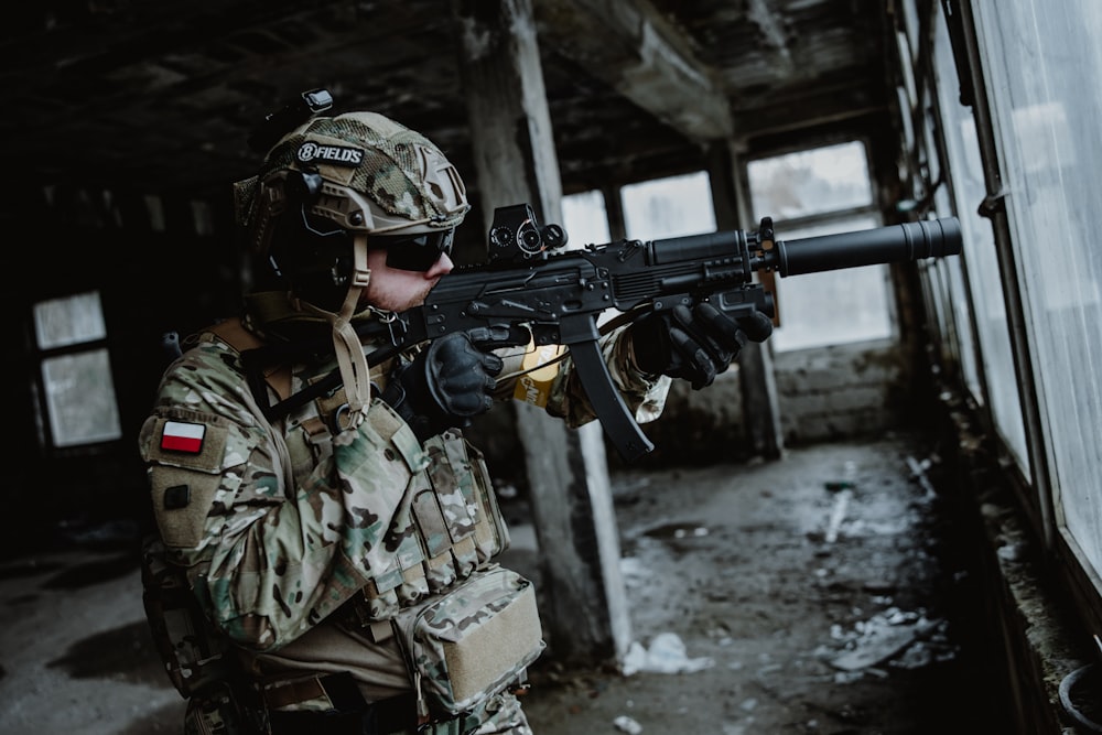 a soldier holding a gun