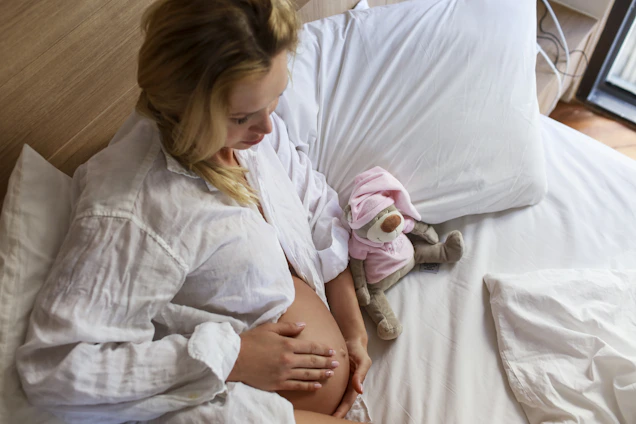 a person holding a stuffed animal