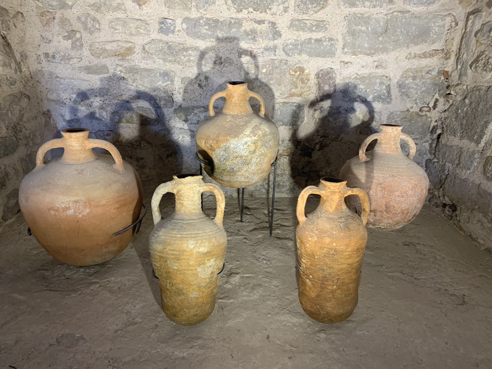 a group of pottery pots