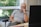A thoughtful man analyzing data on his computer.