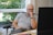 A thoughtful man analyzing data on his computer.
