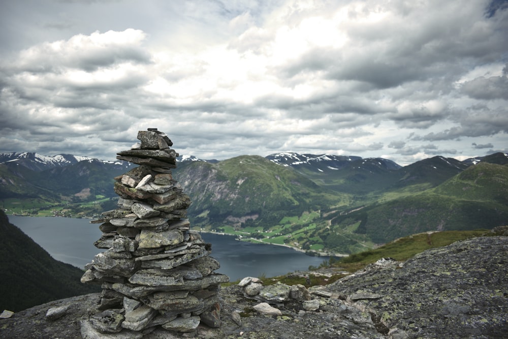 a stack of rocks on a mountain