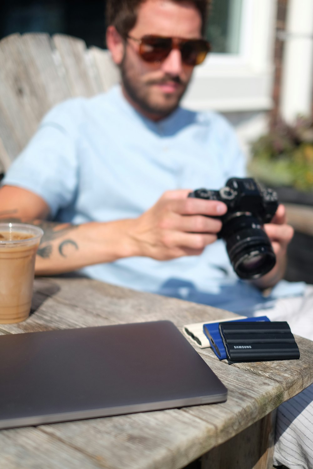 a man holding a camera