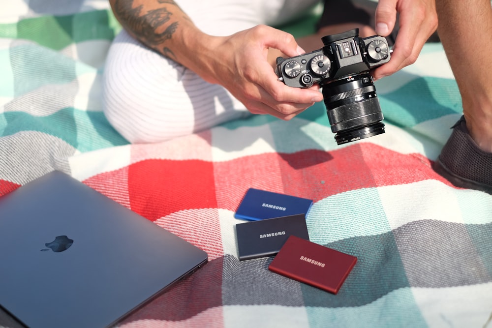 a person holding a camera