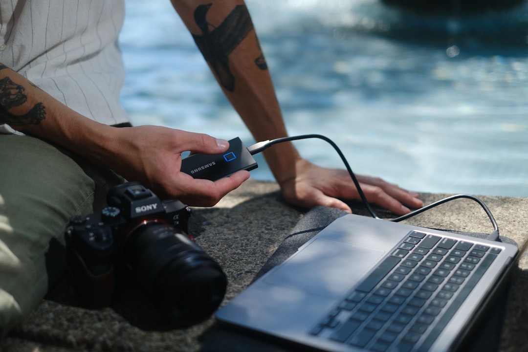 a man using a laptop,