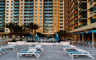 a building with tables and chairs outside