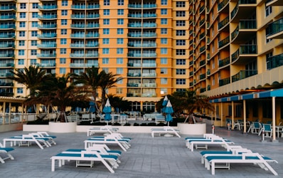 a building with tables and chairs outside