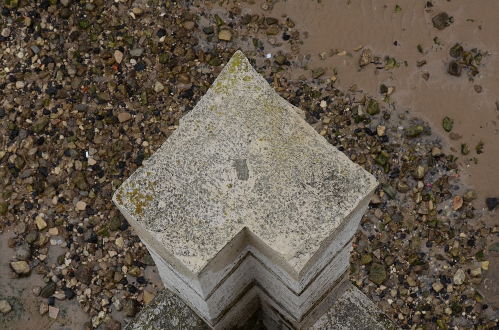 a stone block on a rocky surface