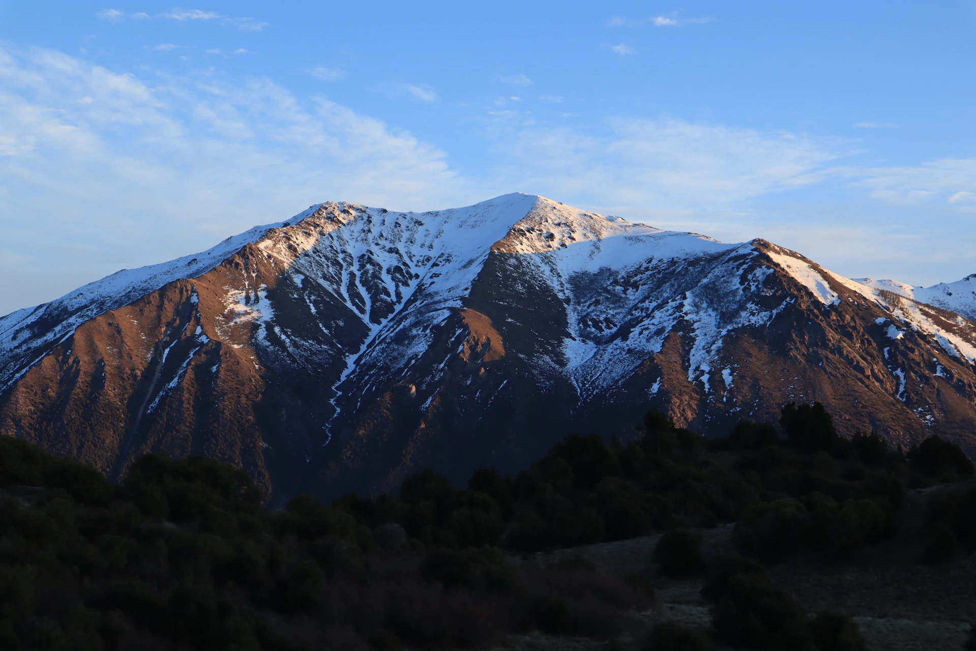 a mountain range with snow