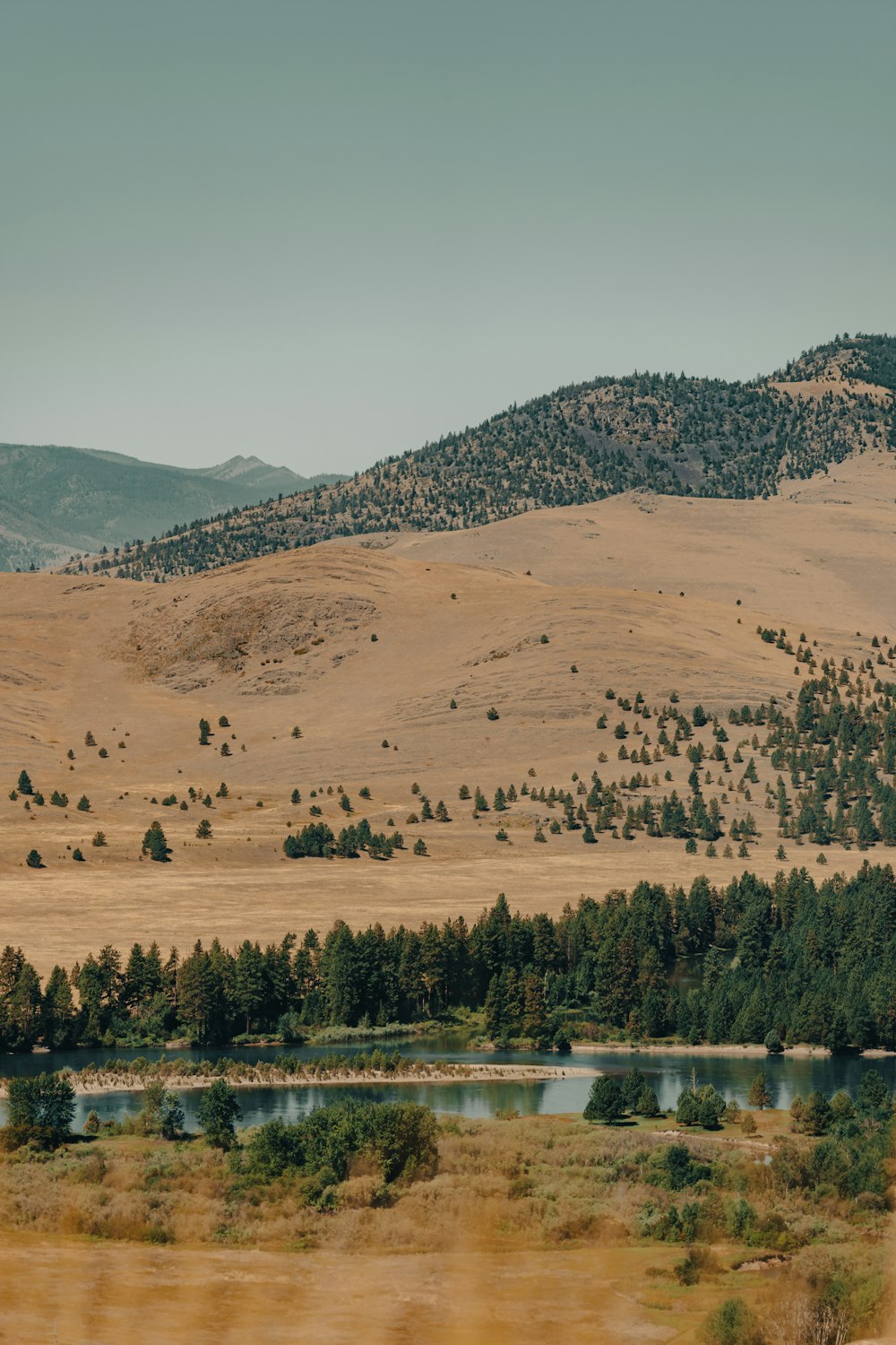 a lake surrounded by hills