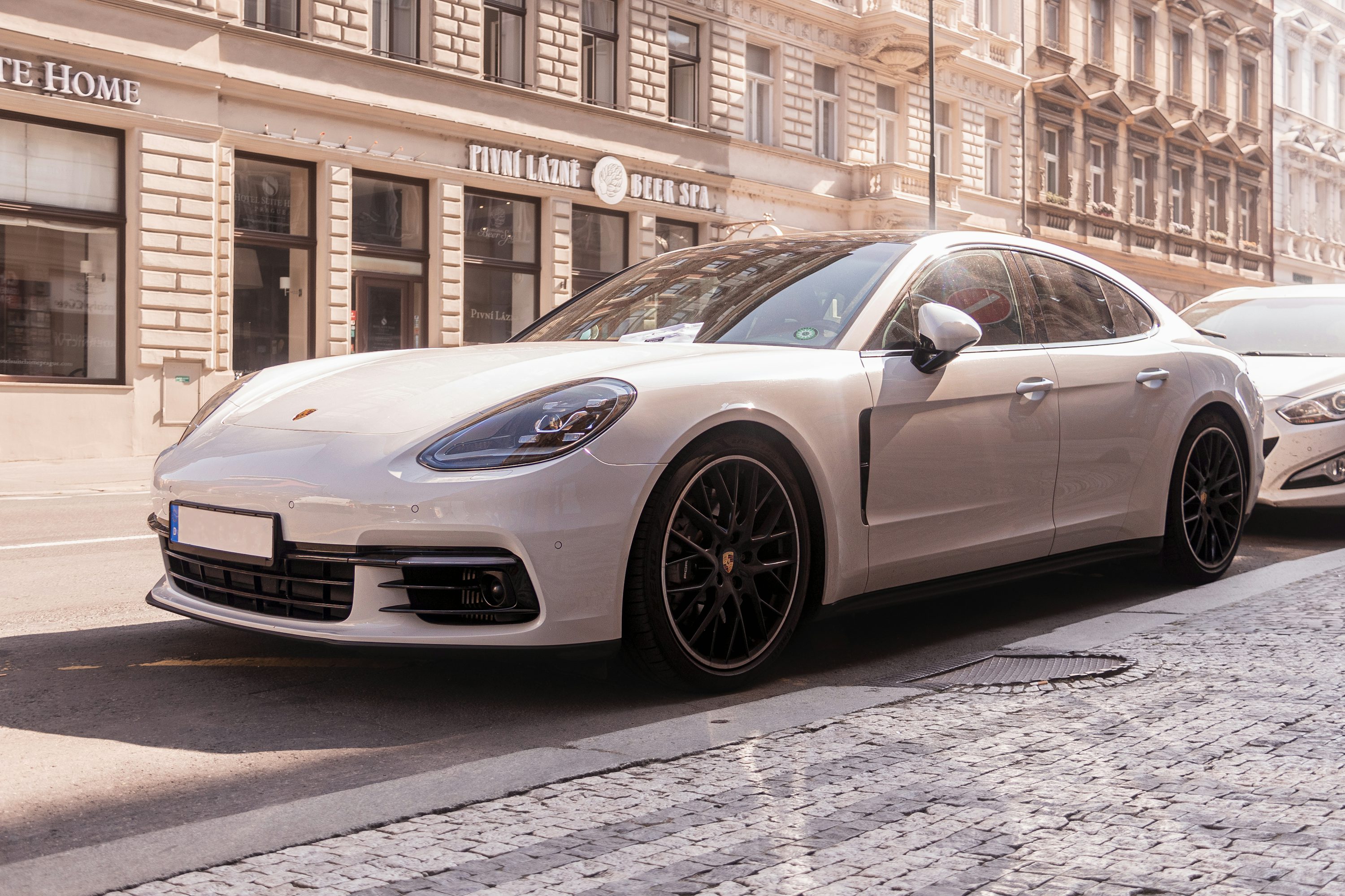 a silver car parked on a street