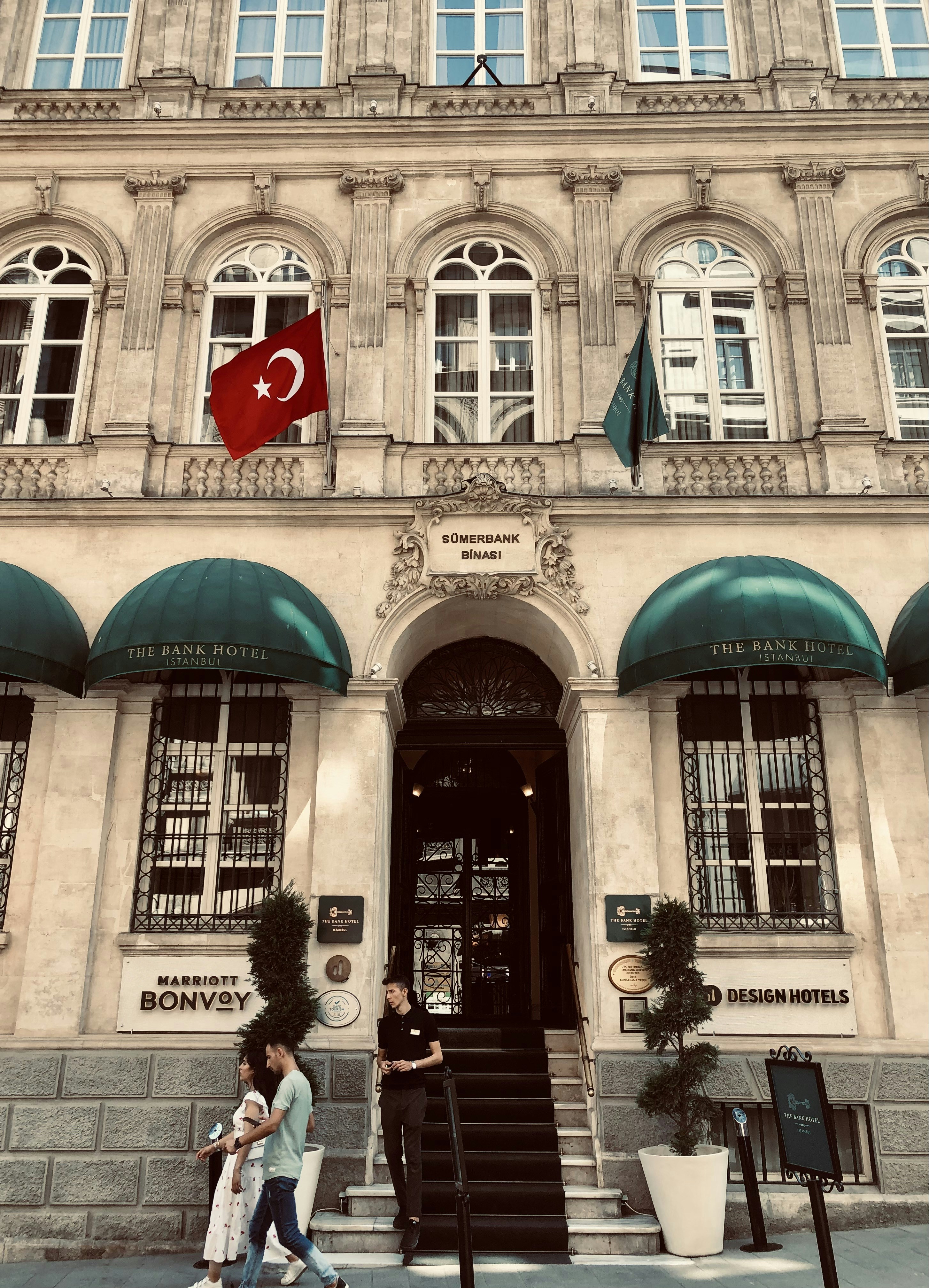 a building with a flag on the front