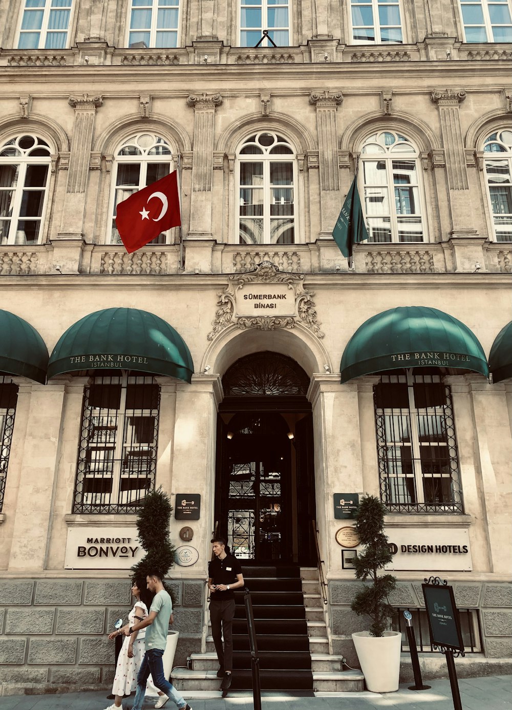 a building with a flag on the front