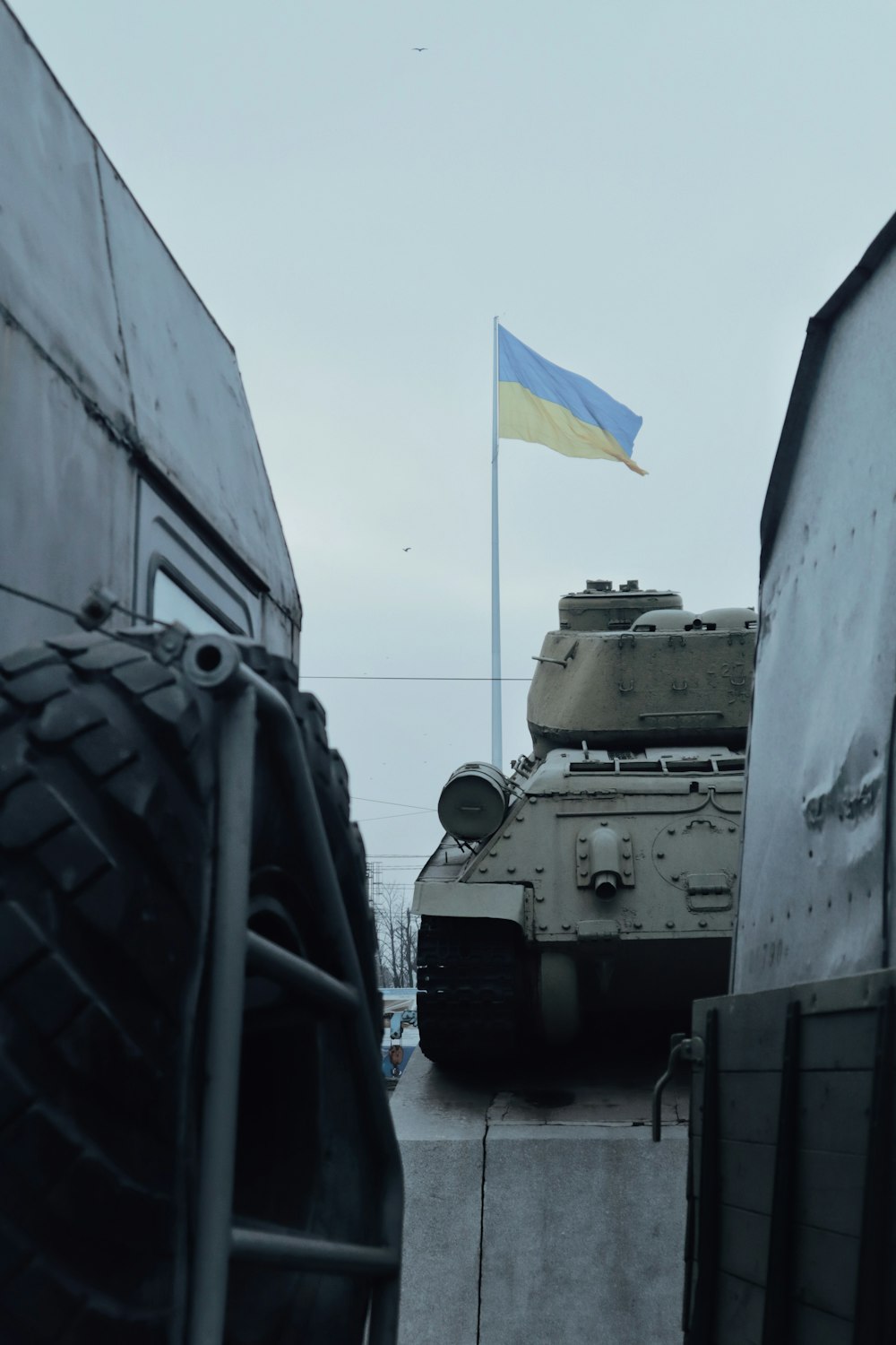 a military tank with a flag on top