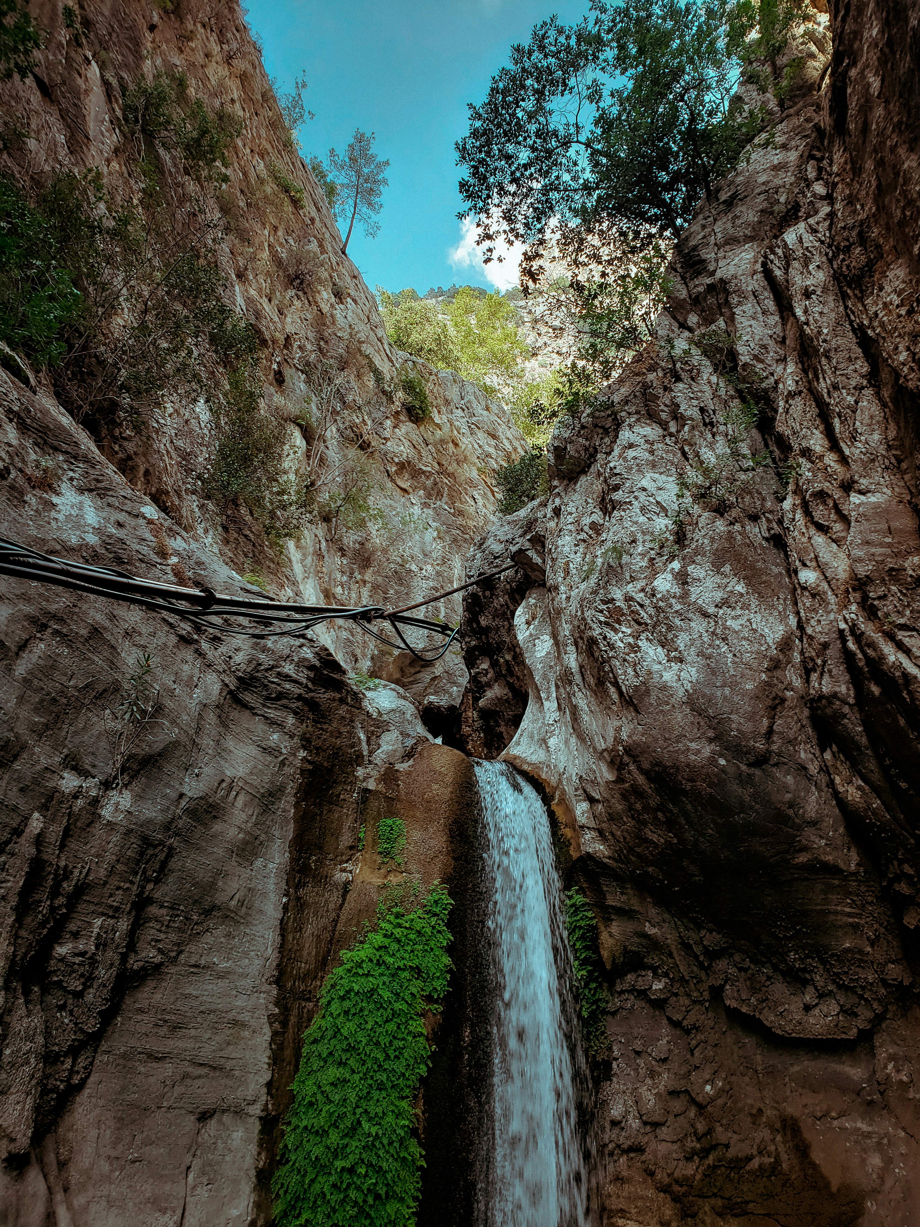 a waterfall in a rocky area