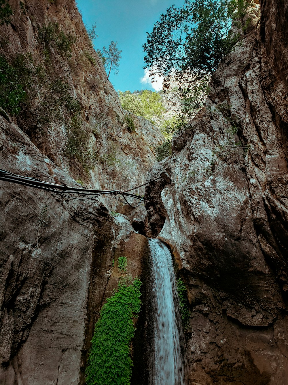 a waterfall in a rocky area