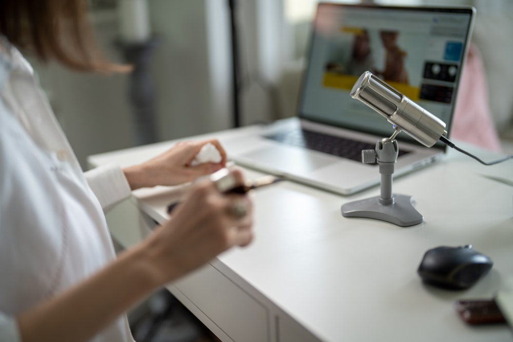 a person using a microscope