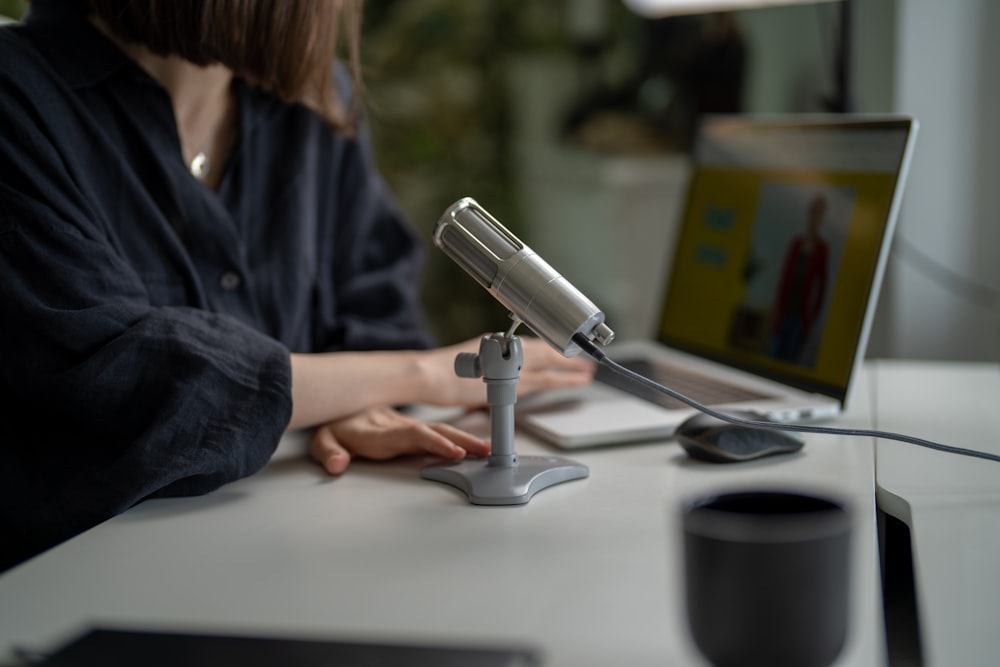 a woman using a laptop