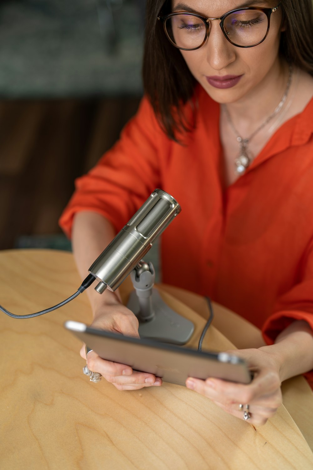 a woman using a microscope