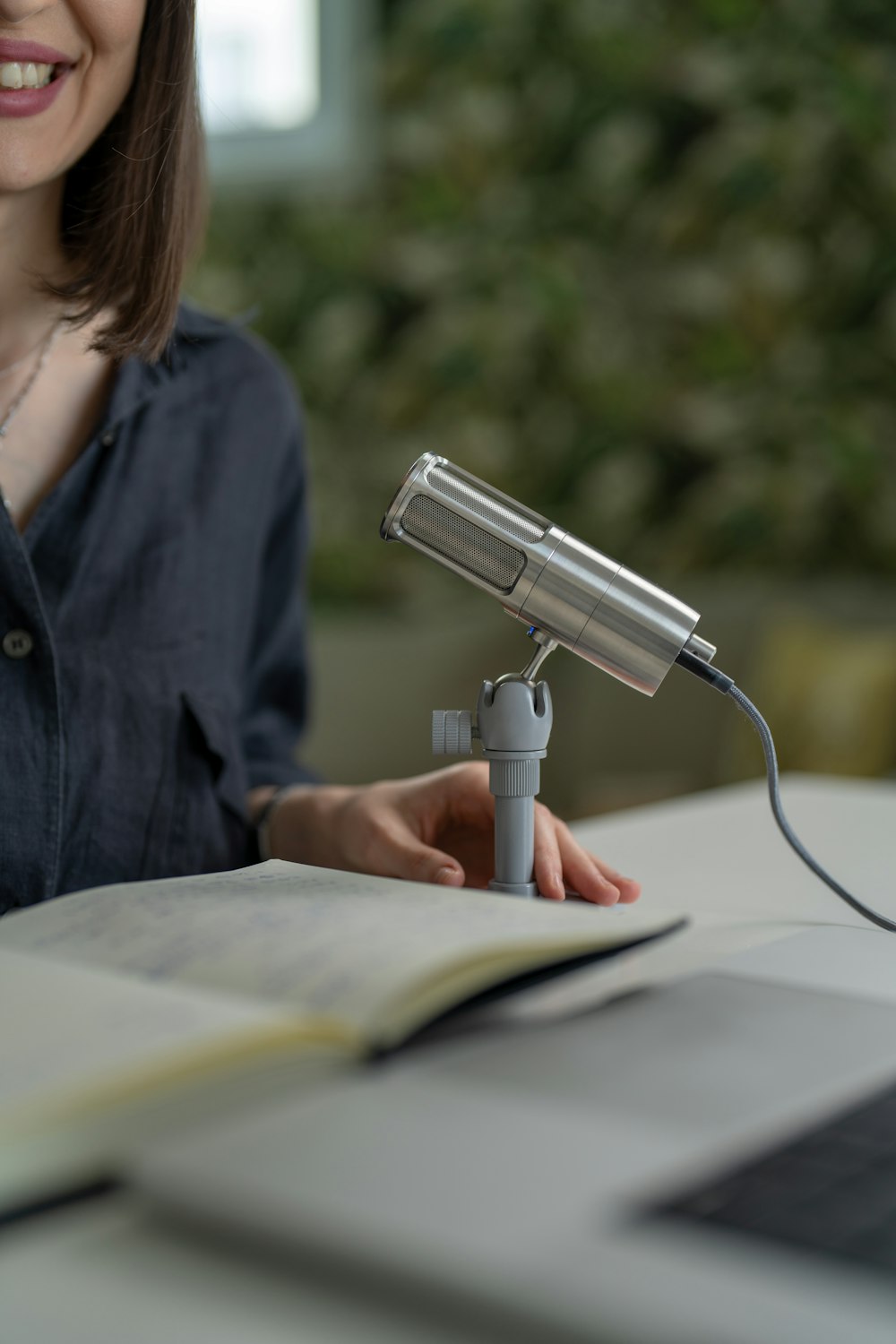 a woman using a microscope