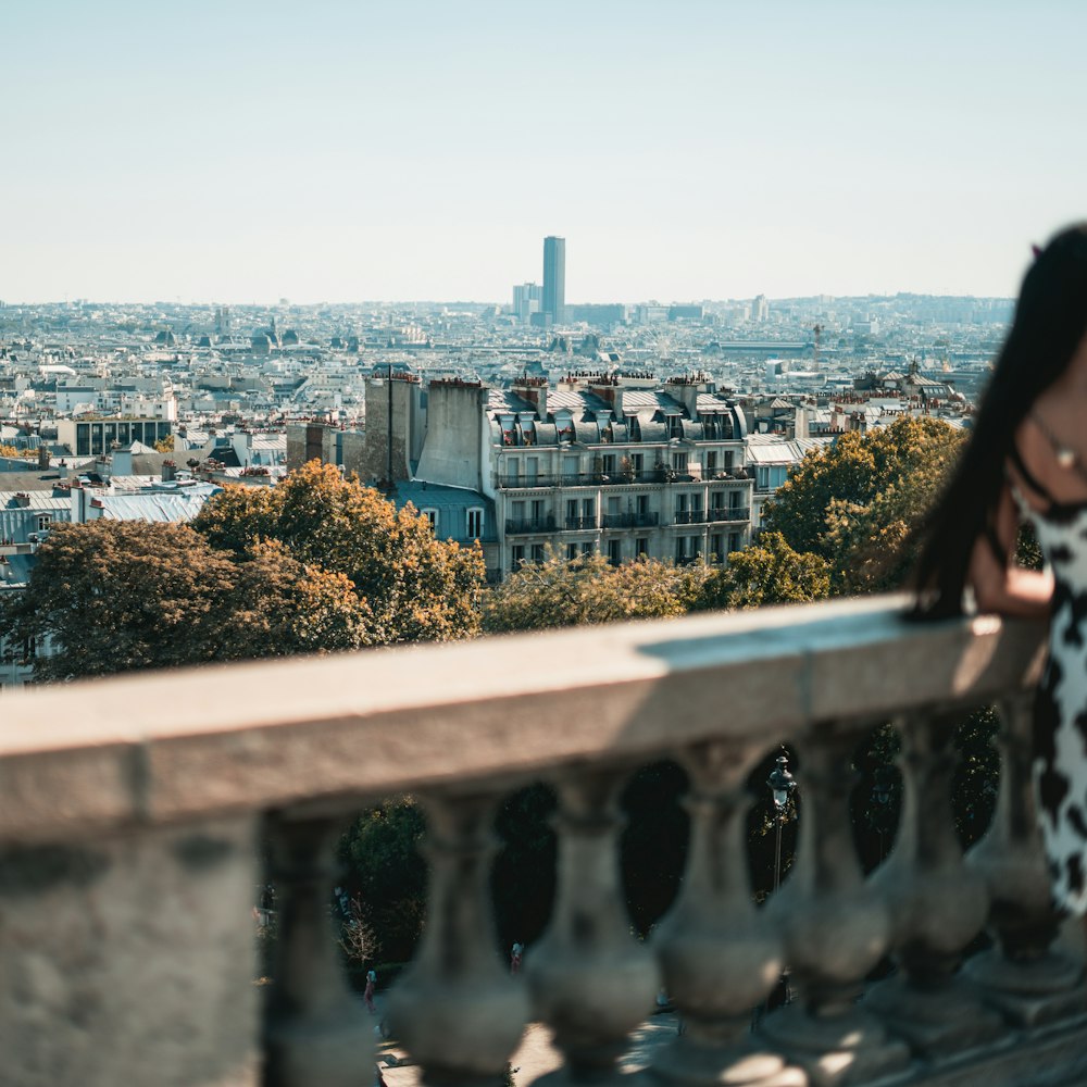 a person looking over a city