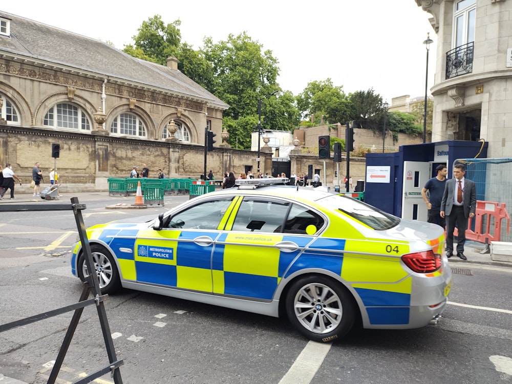 a police car parked on the side of a road