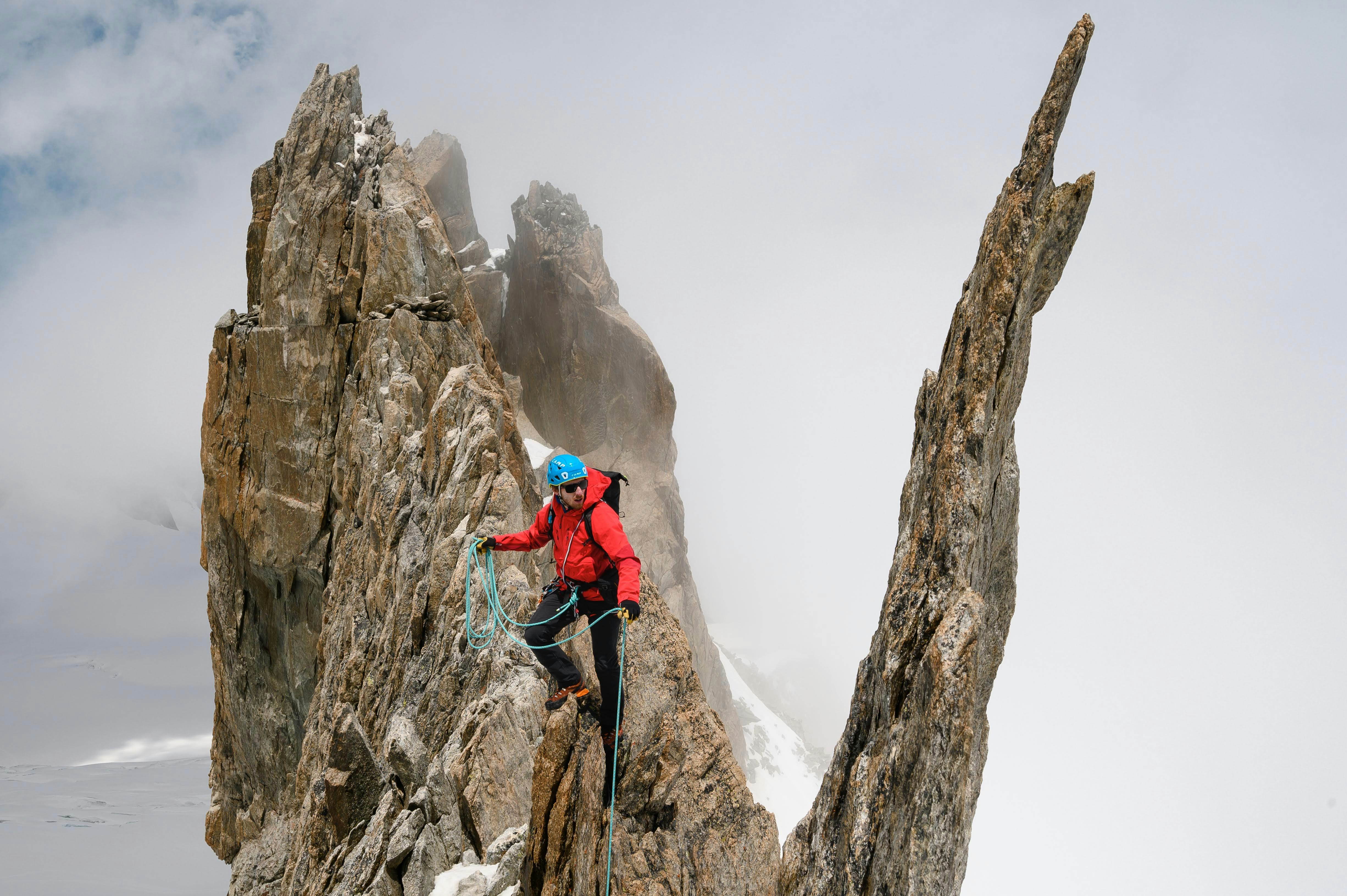 a person climbing a rock