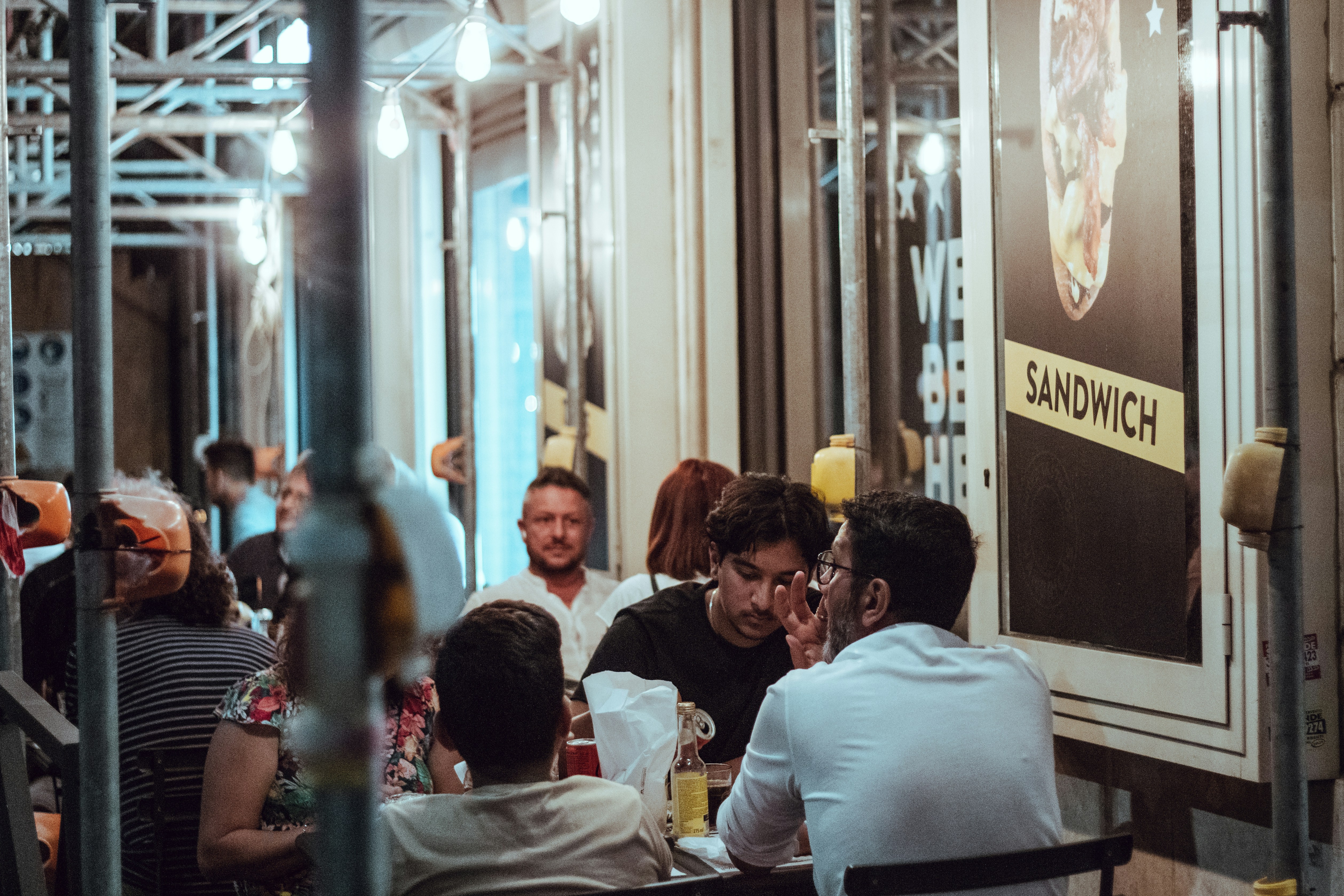 a group of people sitting at a table