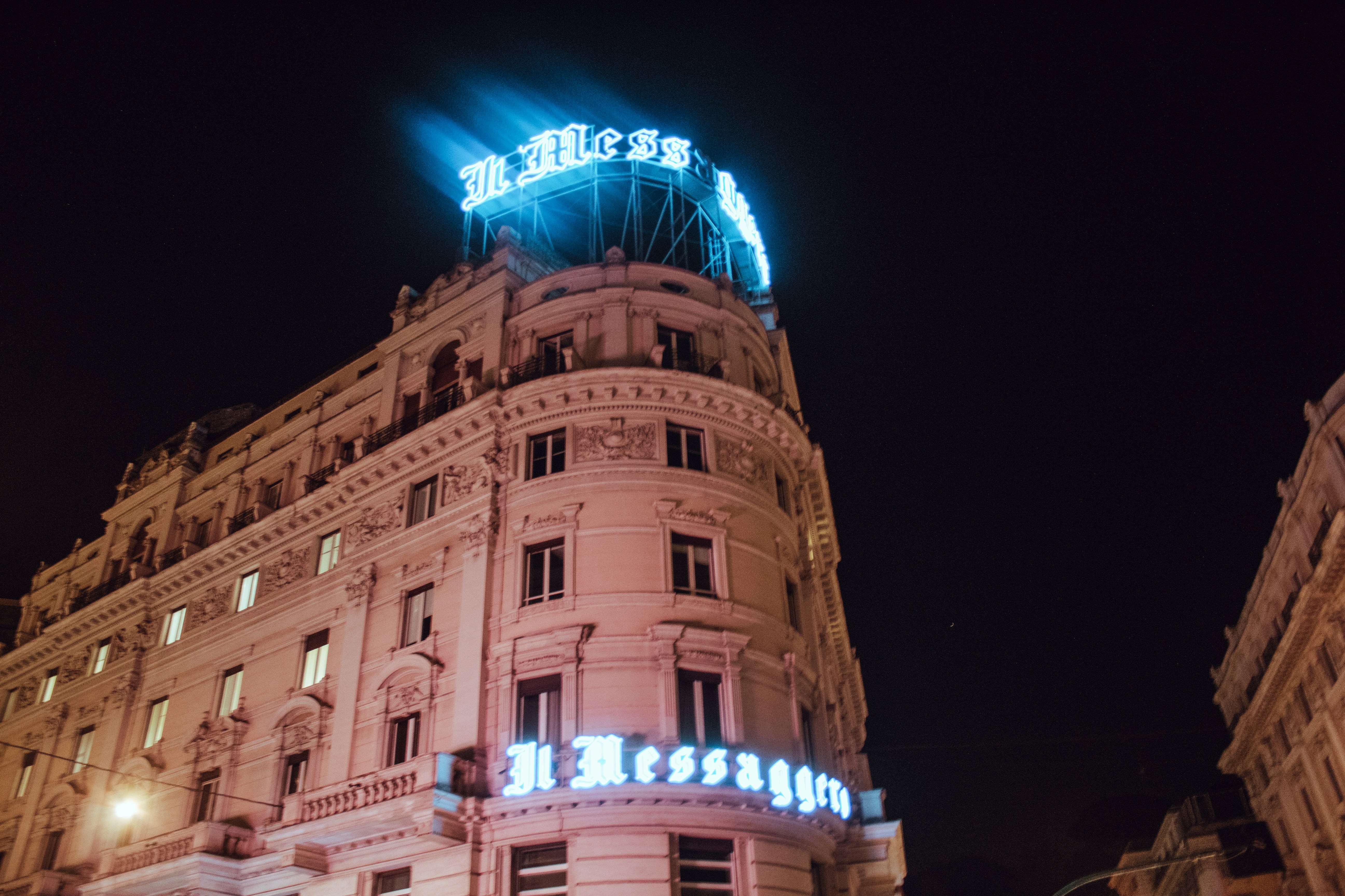 a large building with a blue light