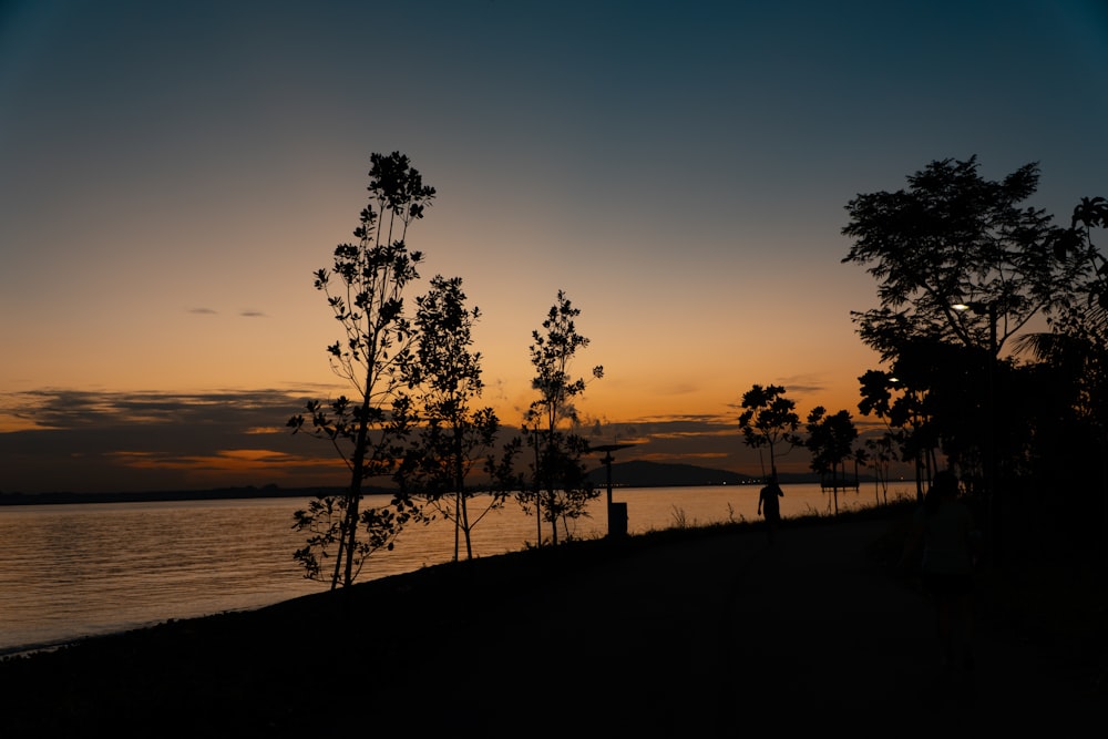 a sunset over a body of water