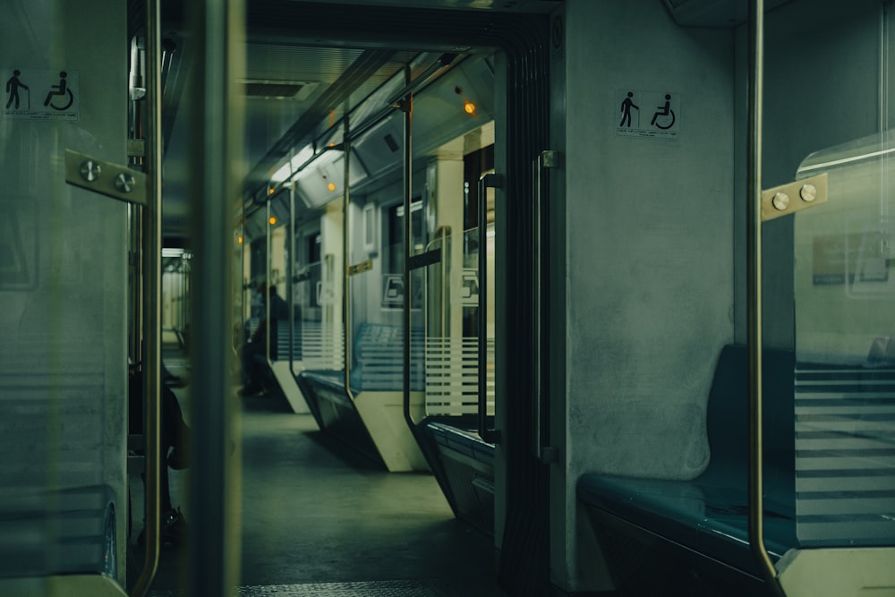 a subway travels through a glass door