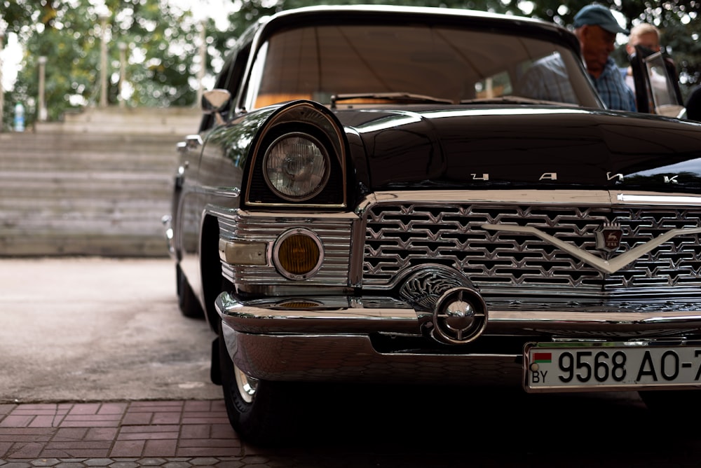 a car parked on a brick road