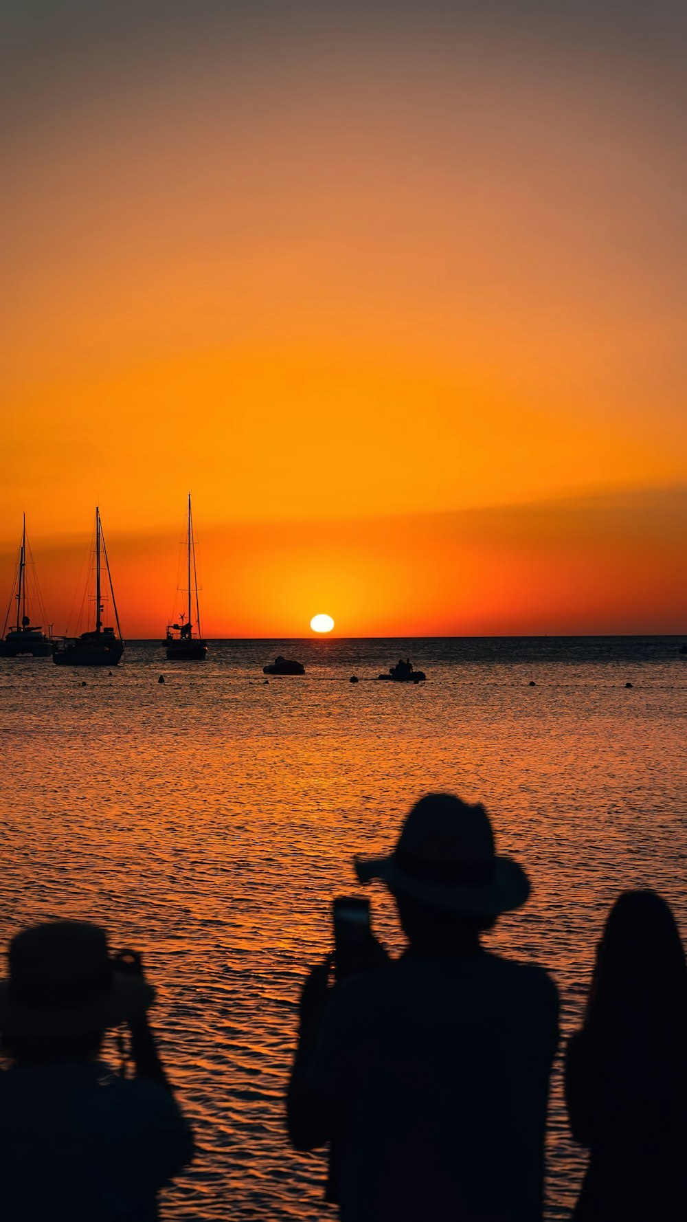 people watching a sunset