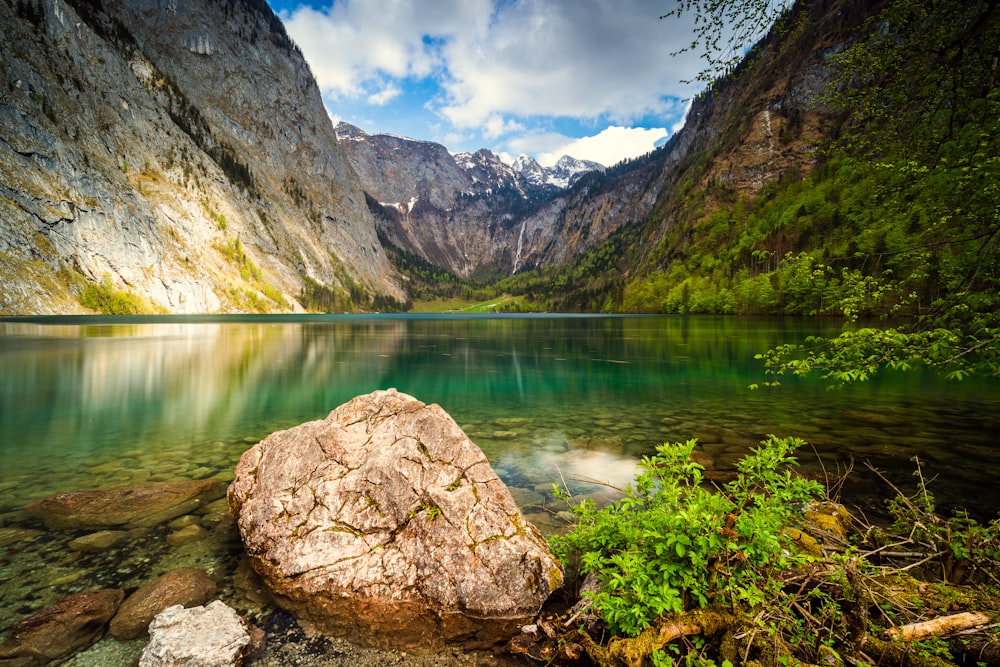 a lake surrounded by mountains