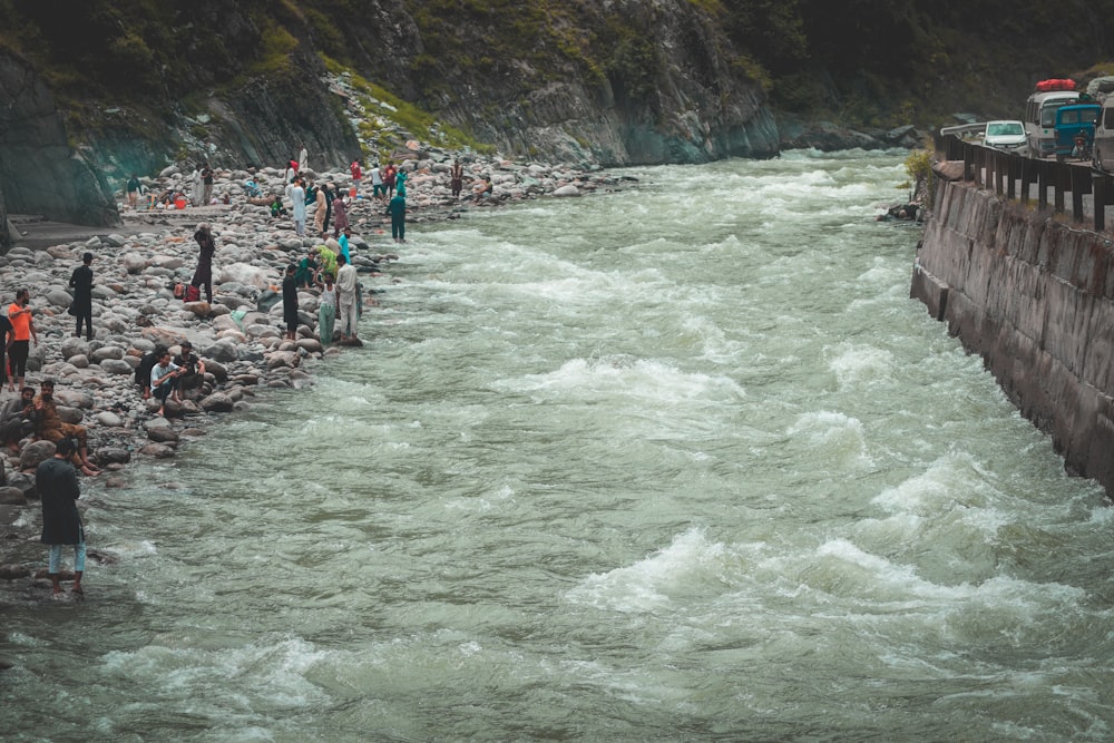 a group of people on a river