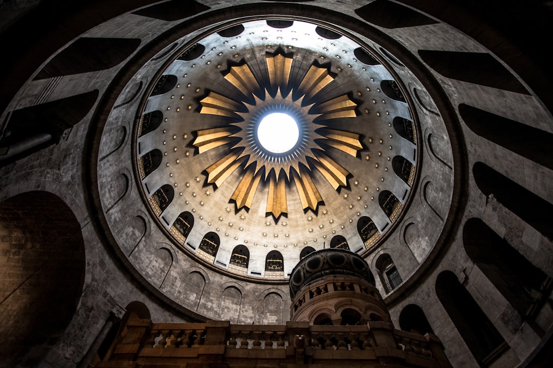 a large clock on Church of the Holy Sepulchre,