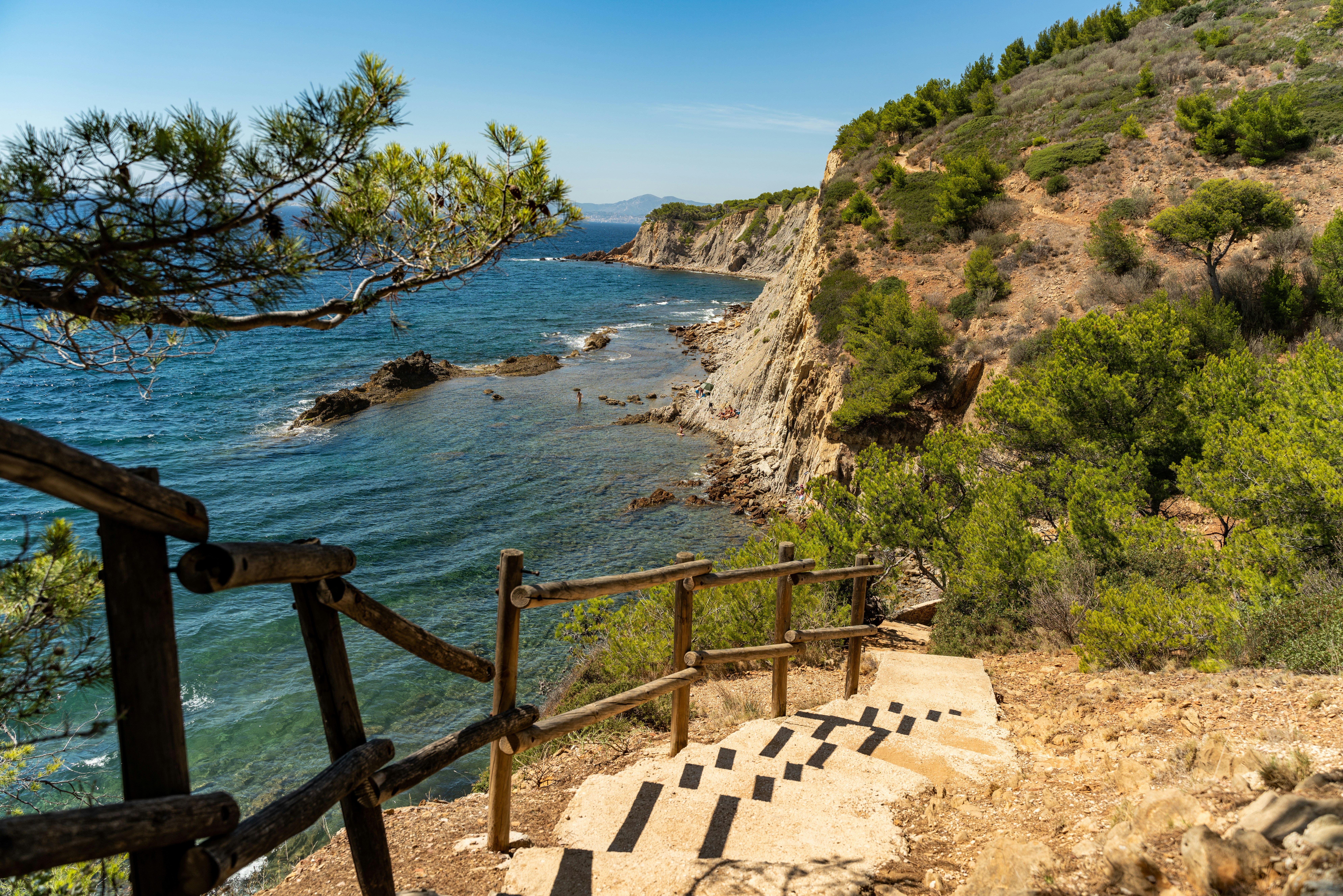 a wooden bridge over a body of water