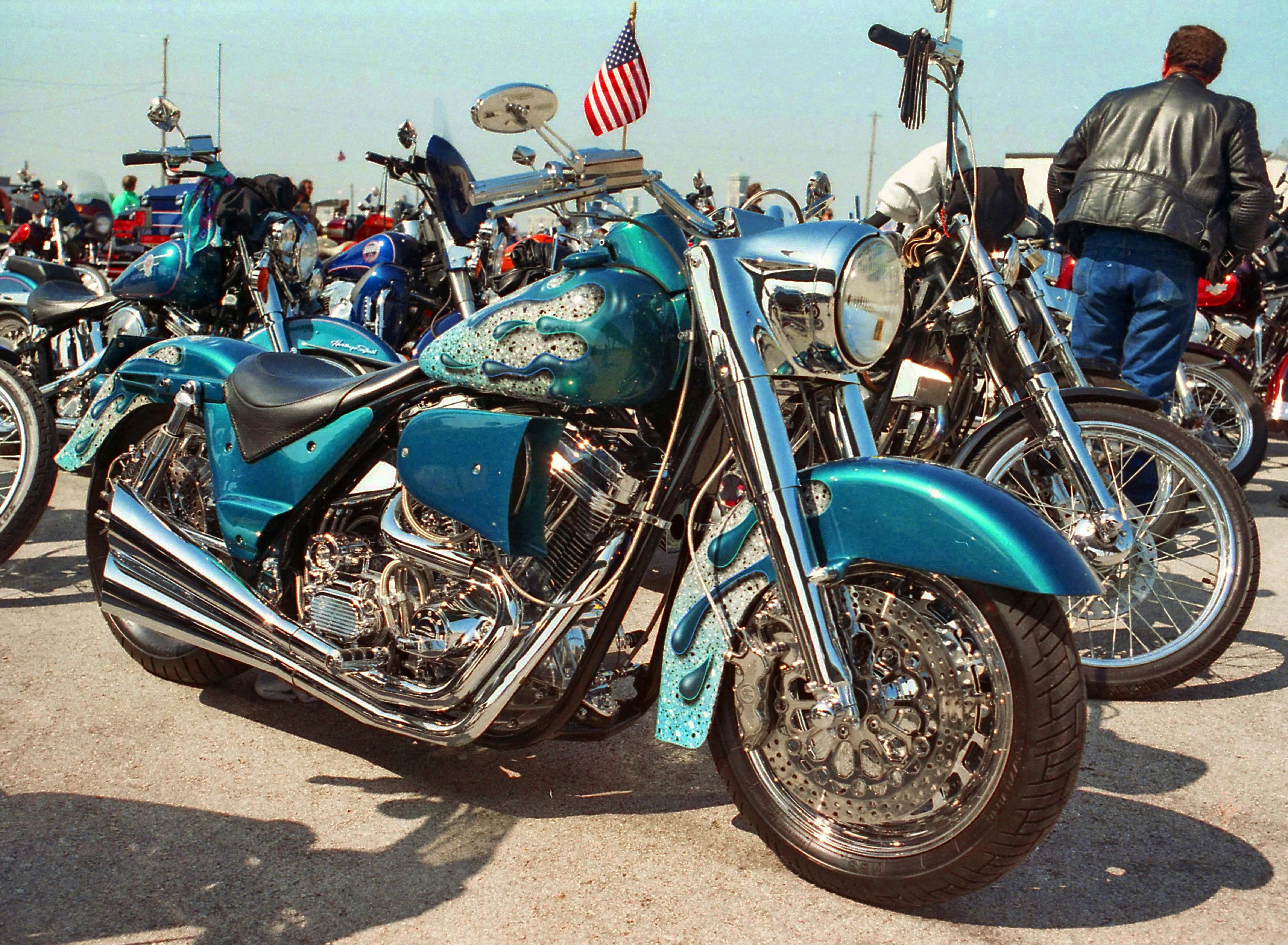 A motorcycle parked on the pavement photo – Free Vehicle Image on Unsplash
