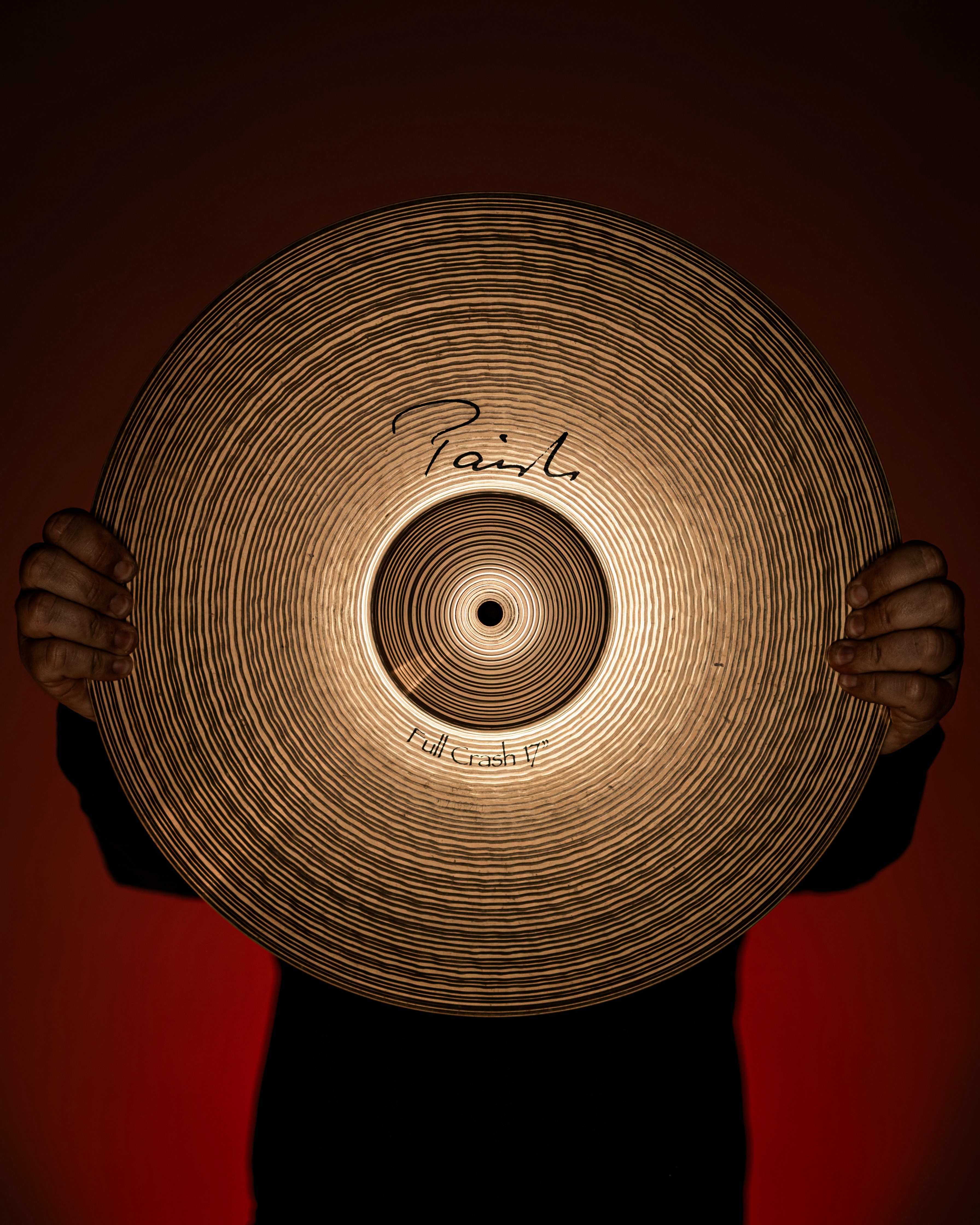 a person holding a frisbee