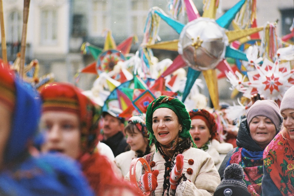 a crowd of people wearing colorful hats