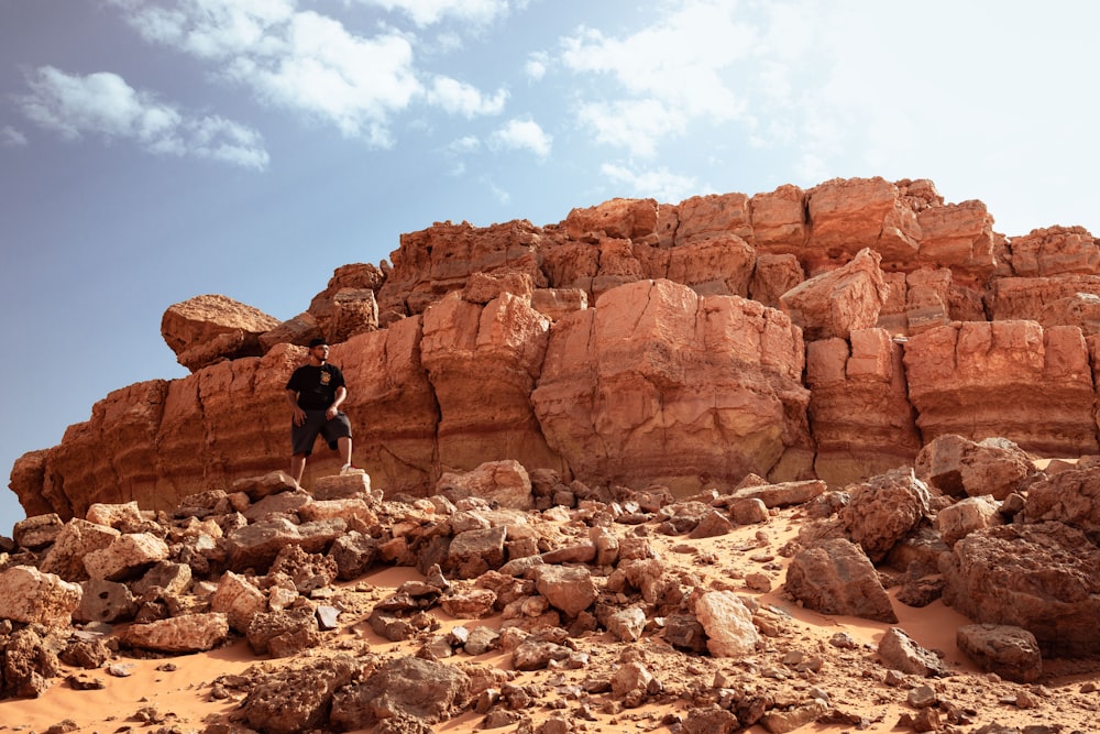 a person standing on a rock