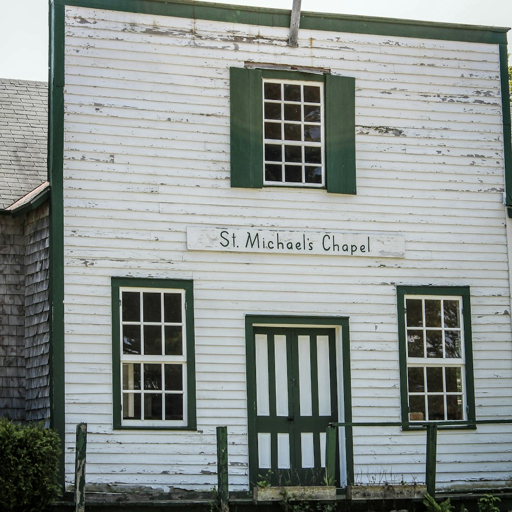 a building with green shutters