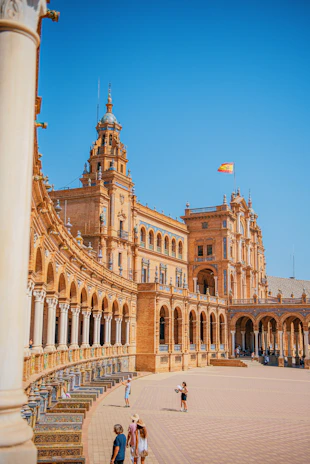 a large building with a flag on top