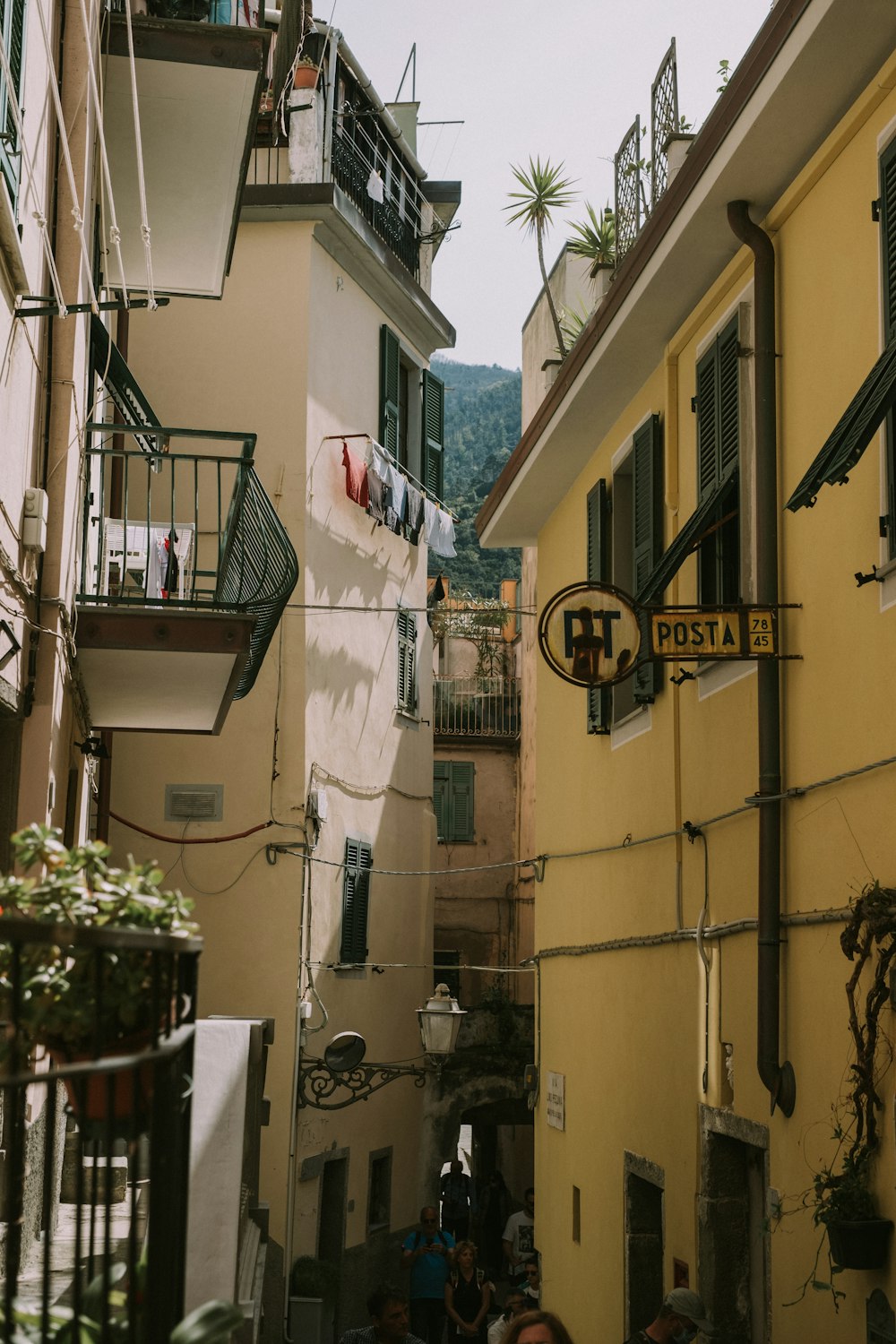 a street with buildings and people