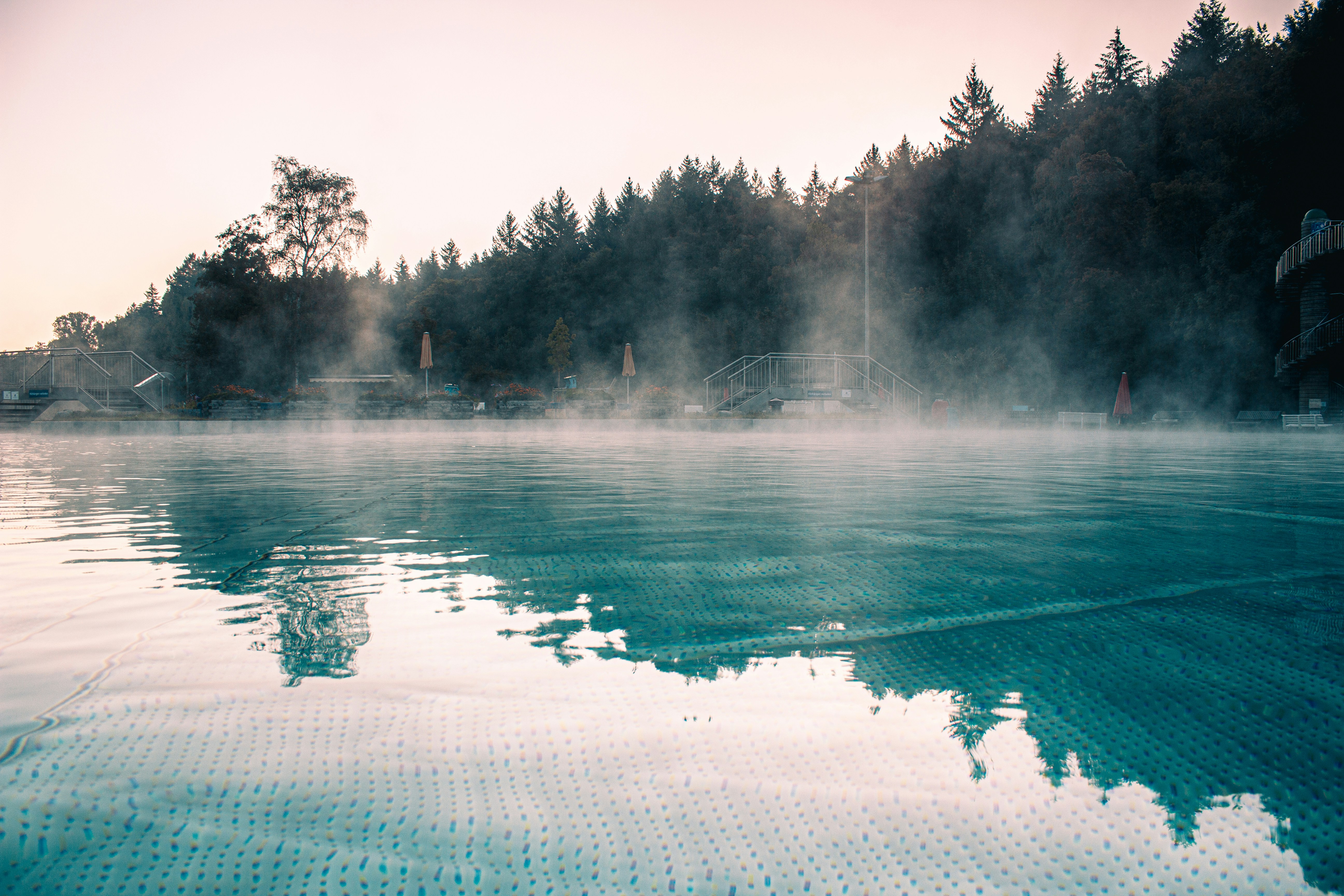 a fountain in a pond