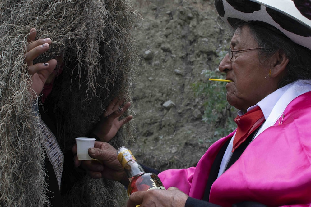 a man and woman drinking beer